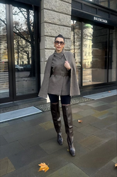 a lady in a coffee brown cloak and vest two-piece set and a pair of black pants